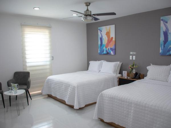 HOTEL TRAMONTO MAZATLAN : photo 2 de la chambre chambre exécutive avec 2 lits queen-size 