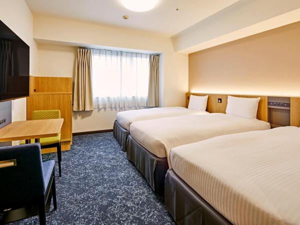 Hotel Lumiere Kasai : photo 1 de la chambre chambre lits jumeaux avec lit d'appoint - non-fumeurs