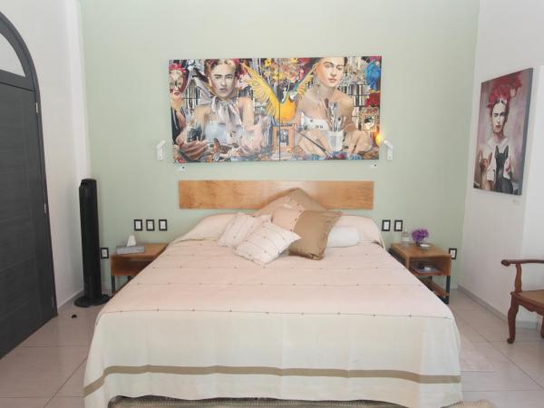 LARIMAR Gallery y Hotel Boutique : photo 7 de la chambre chambre lit king-size supérieure