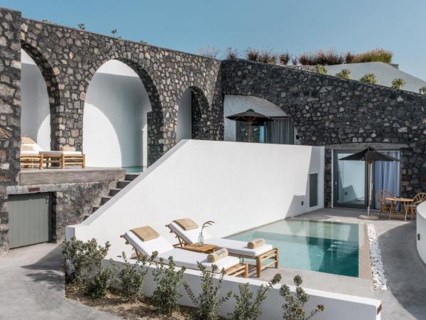 Santo Pure Oia Suites & Villas : photo 9 de la chambre suite junior troglodyte avec piscine