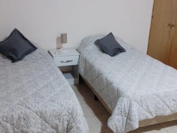 Lo de Chavela : photo 8 de la chambre chambre triple avec salle de bains commune