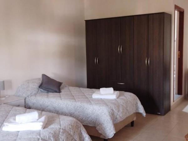 Lo de Chavela : photo 10 de la chambre chambre quadruple avec salle de bains privative