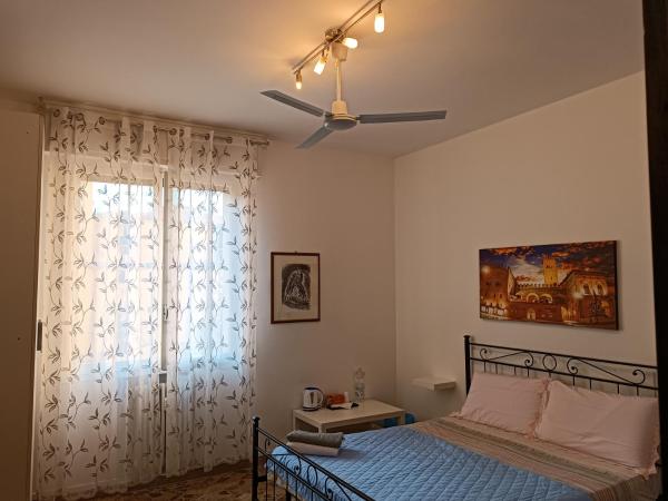 Affittacamere Pratello 97 : photo 4 de la chambre chambre double avec lit d'appoint