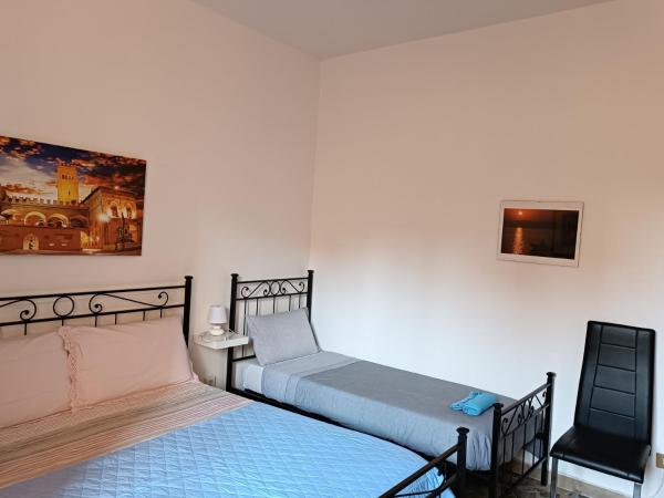 Affittacamere Pratello 97 : photo 8 de la chambre chambre double avec lit d'appoint