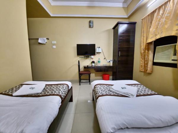 BHIMAS INN -Puratchi Thalaivar Dr M G Ramachandran Central Railway Station Chennai : photo 6 de la chambre chambre double Économique