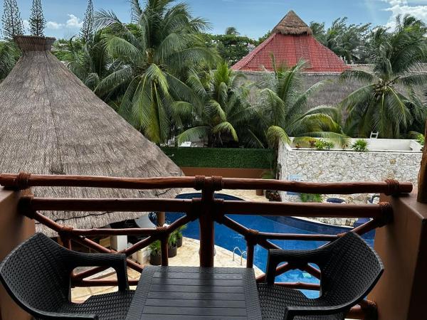 Hotel Beló Isla Mujeres - All Inclusive : photo 6 de la chambre suite junior deluxe avec 2 lits doubles et balcon