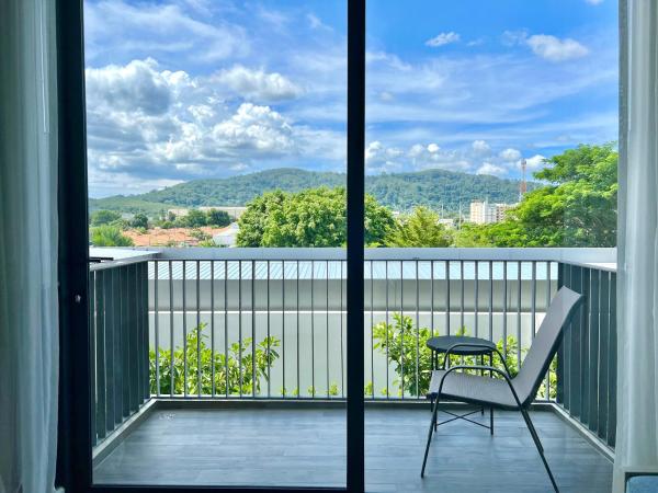 Seabed Grand Hotel Phuket - SHA Extra Plus : photo 9 de la chambre chambre double ou lits jumeaux deluxe – vue sur jardin