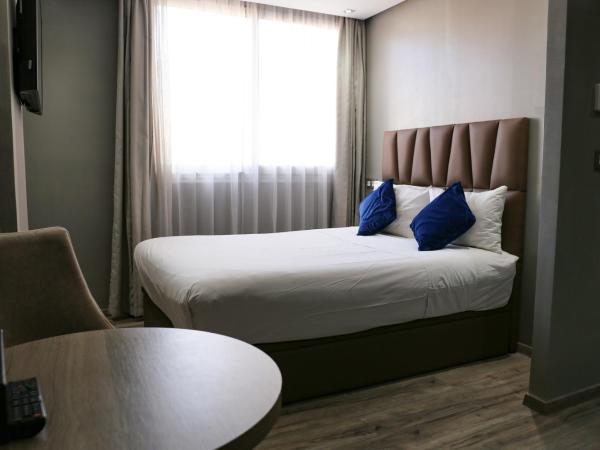 Le 22 Appart'Hotel : photo 5 de la chambre studio exécutif