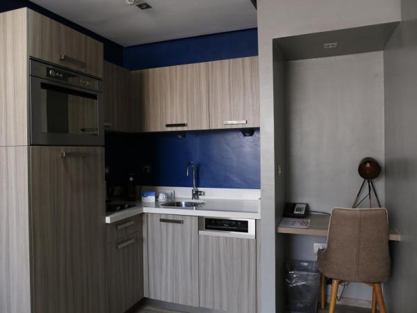 Le 22 Appart'Hotel : photo 4 de la chambre studio exécutif