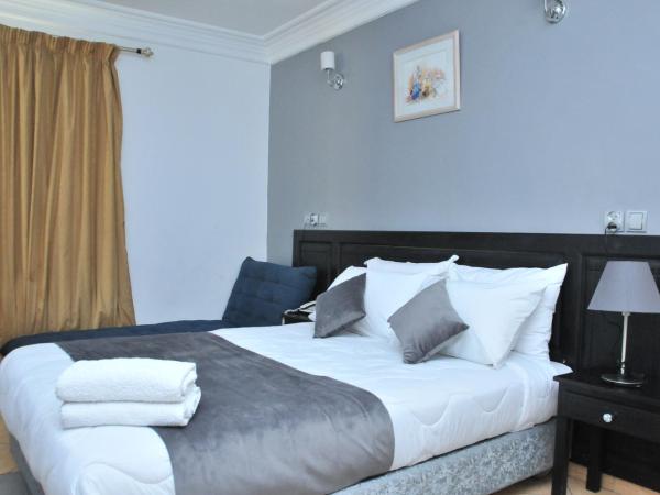 EAST WEST HOTEL : photo 4 de la chambre chambre triple