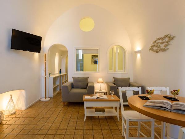 Pantelia Suites : photo 10 de la chambre suite junior avec bain à remous - vue sur caldeira