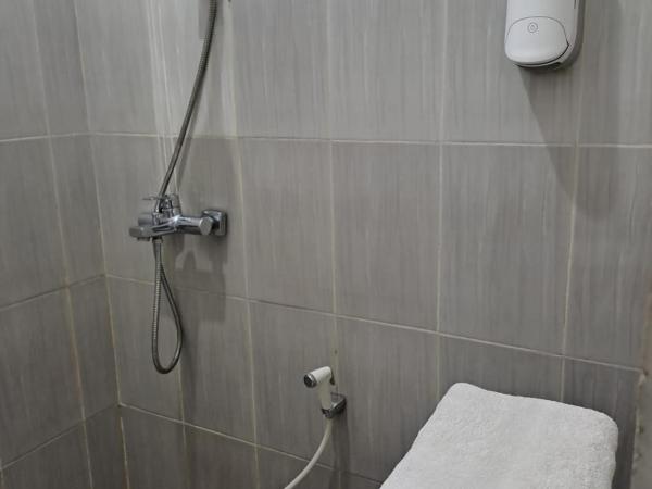 UNIK Guest House Syariah : photo 1 de la chambre chambre double standard