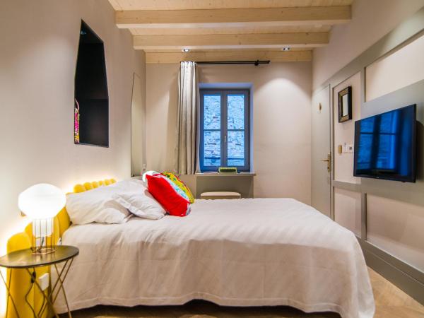 The Melegran : photo 2 de la chambre chambre deluxe (2 adultes + 1 enfant)