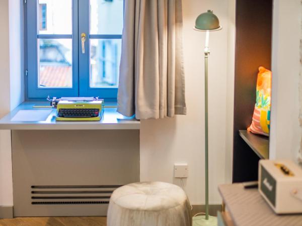 The Melegran : photo 5 de la chambre deluxe family room with two queen beds