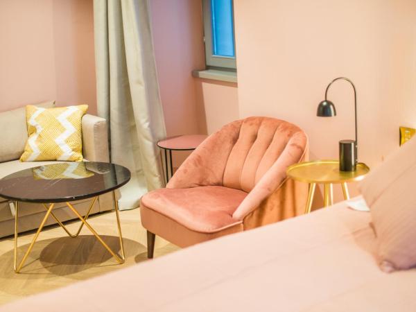 The Melegran : photo 2 de la chambre chambre double deluxe (2 adultes + 1 enfant)