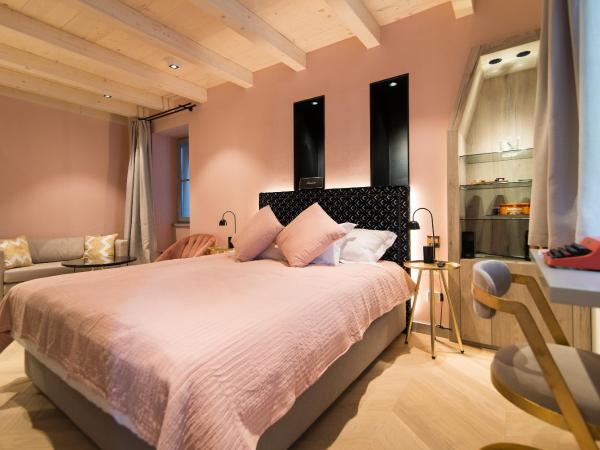 The Melegran : photo 1 de la chambre chambre double deluxe (2 adultes + 1 enfant)