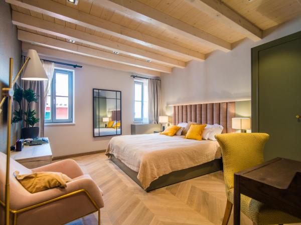 The Melegran : photo 1 de la chambre suite deluxe - vue sur mer (bâtiment annexe)