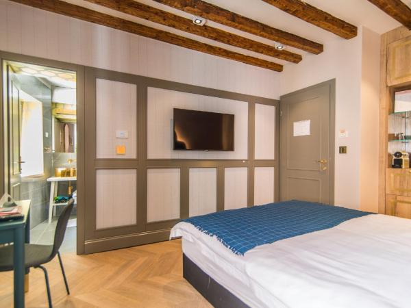 The Melegran : photo 4 de la chambre chambre lits jumeaux de luxe - annexe