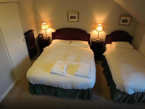 A-Haven Townhouse Hotel : photo 1 de la chambre chambre lits jumeaux