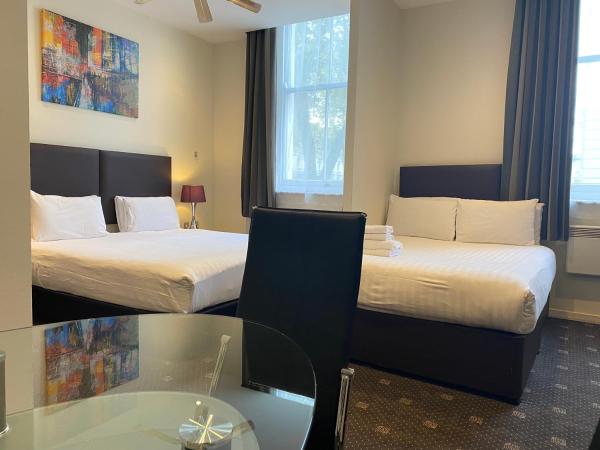 Grand Plaza Serviced Apartments : photo 8 de la chambre studio exécutif quadruple