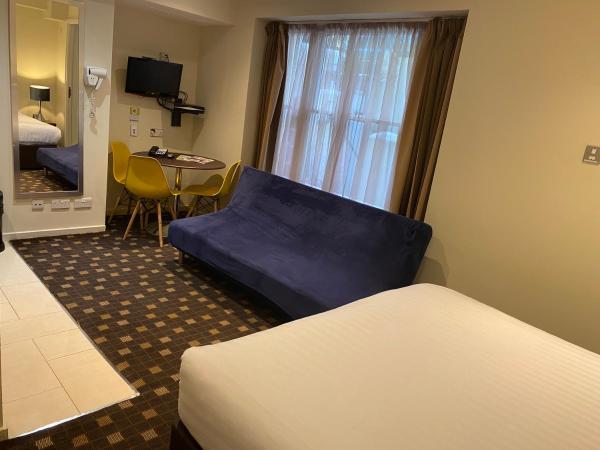 Grand Plaza Serviced Apartments : photo 9 de la chambre studio triple exécutif