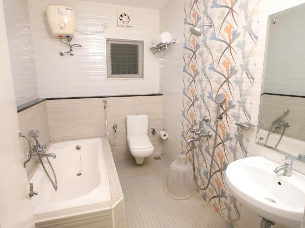 R-hotels Rithikha Inn porur : photo 2 de la chambre chambre double deluxe (2 adultes + 1 enfant)