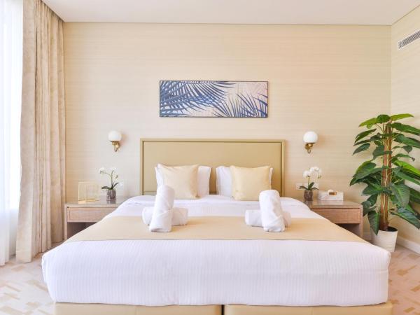 Ultra Luxury Palm Tower with Shared 5 Star Hotel Facilities : photo 8 de la chambre suite deluxe - vue sur mer