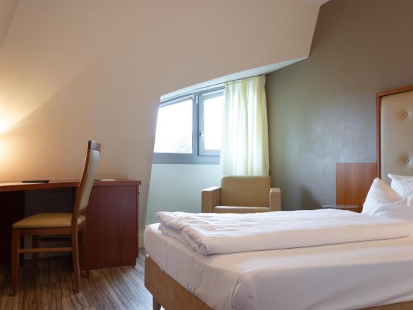 Hotel Am Blauen Wunder : photo 4 de la chambre chambre simple