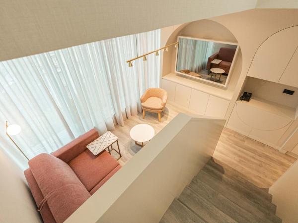 LUSTER Hotel : photo 6 de la chambre suite en duplex 2 chambres