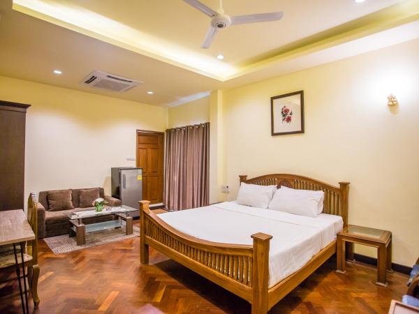 Prince Hotel Chiang Mai : photo 1 de la chambre grande chambre deluxe
