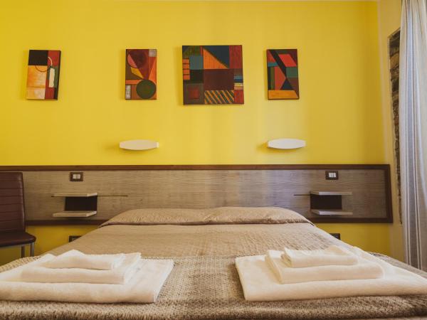 VIA VENEZIA 76 : photo 4 de la chambre chambre double ou lits jumeaux avec salle de bains privative