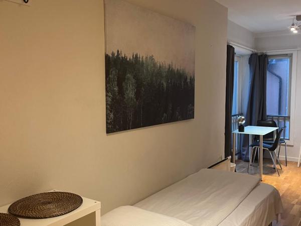 City Hostel Bergen : photo 10 de la chambre chambre triple avec salle de bains