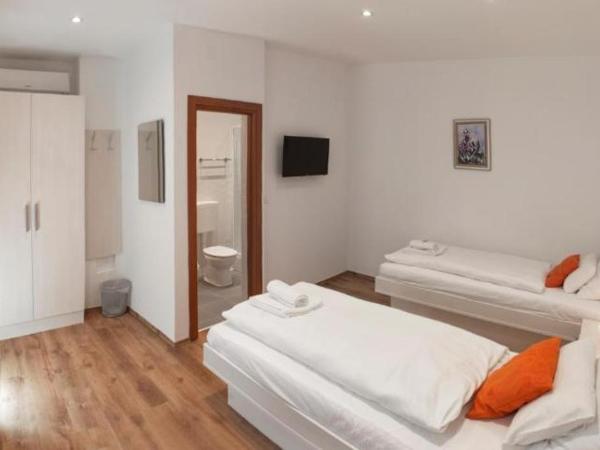 Rooms Lidija : photo 4 de la chambre chambre lits jumeaux