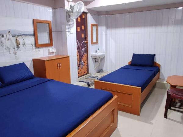 S.S.K RESIDENCY : photo 3 de la chambre chambre triple supérieure