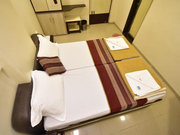 Hotel Kalpana Palace, Mumbai : photo 8 de la chambre chambre double ou lits jumeaux Économique 