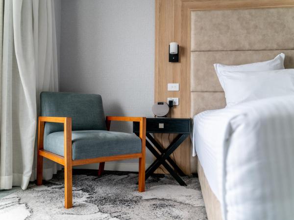 Novotel Sydney Brighton Beach : photo 9 de la chambre chambre lit king-size supérieure avec baignoire spa
