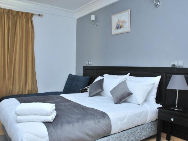 EAST WEST HOTEL : photo 6 de la chambre chambre triple