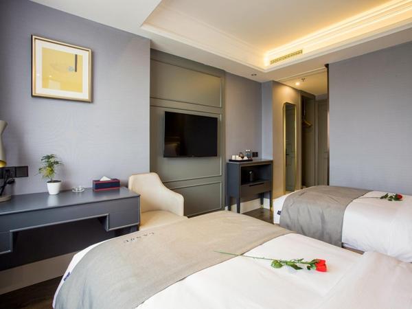 LanOu Hotel Wuhan CapitaMall Wusheng Road Metro Station : photo 1 de la chambre chambre lits jumeaux deluxe 