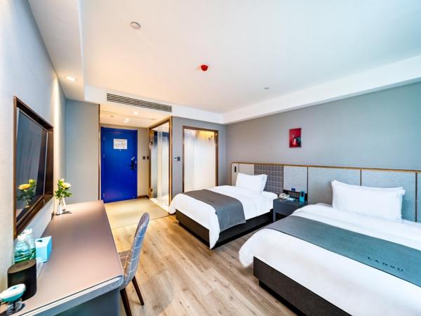LanOu Hotel Wuhan CapitaMall Wusheng Road Metro Station : photo 6 de la chambre chambre lits jumeaux deluxe 