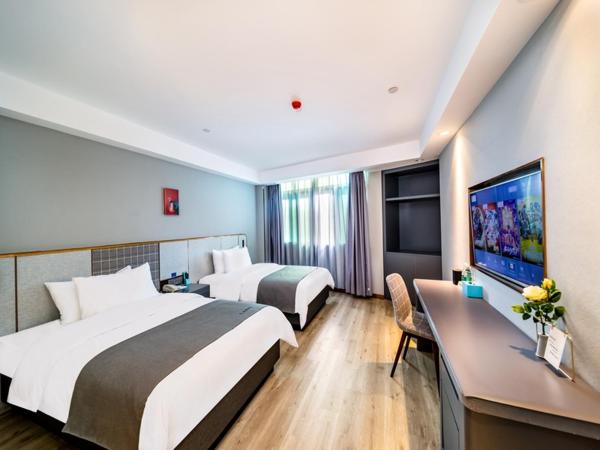 LanOu Hotel Wuhan CapitaMall Wusheng Road Metro Station : photo 9 de la chambre chambre lits jumeaux deluxe 