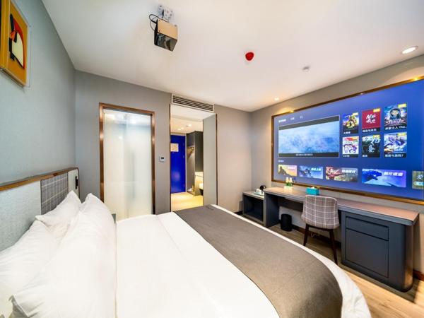 LanOu Hotel Wuhan CapitaMall Wusheng Road Metro Station : photo 8 de la chambre lanyi double room with movie