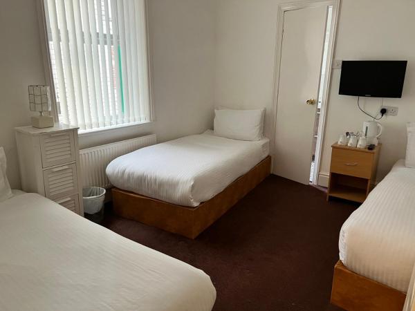 Cheers Hotel : photo 4 de la chambre chambre triple avec baignoire