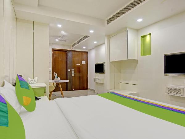Treebo Trend Jannat Residency : photo 3 de la chambre chambre double deluxe