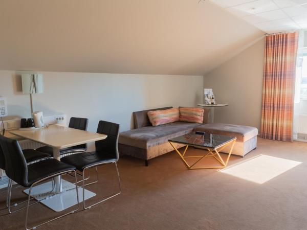 Best Western Plus John Bauer Hotel : photo 2 de la chambre hébergement 2 chambres avec lit king-size et lit double