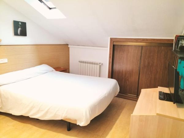 Hostal El Descanso : photo 2 de la chambre petite chambre double ou lits jumeaux