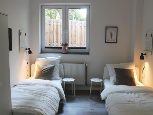 Schlafkonzept Hannover : photo 10 de la chambre chambre lits jumeaux standard avec salle de bains commune