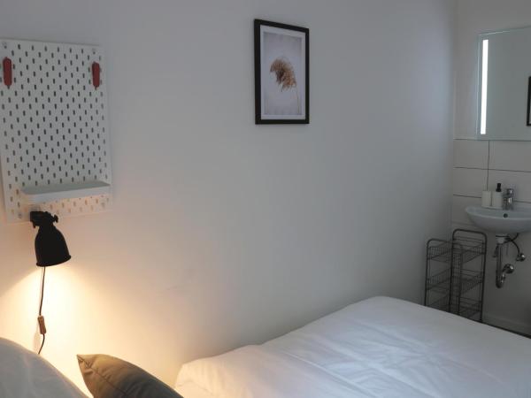 Schlafkonzept Hannover : photo 9 de la chambre chambre lits jumeaux standard avec salle de bains commune