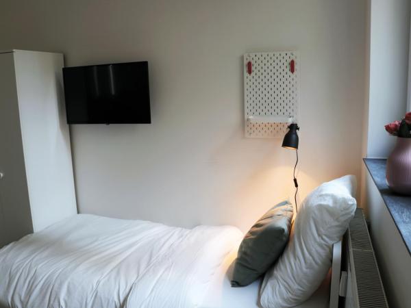 Schlafkonzept Hannover : photo 7 de la chambre chambre lits jumeaux standard avec salle de bains commune