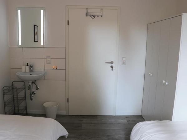 Schlafkonzept Hannover : photo 5 de la chambre chambre lits jumeaux standard avec salle de bains commune
