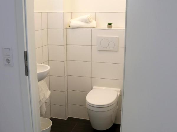 Schlafkonzept Hannover : photo 5 de la chambre chambre lits jumeaux standard avec salle de bains commune